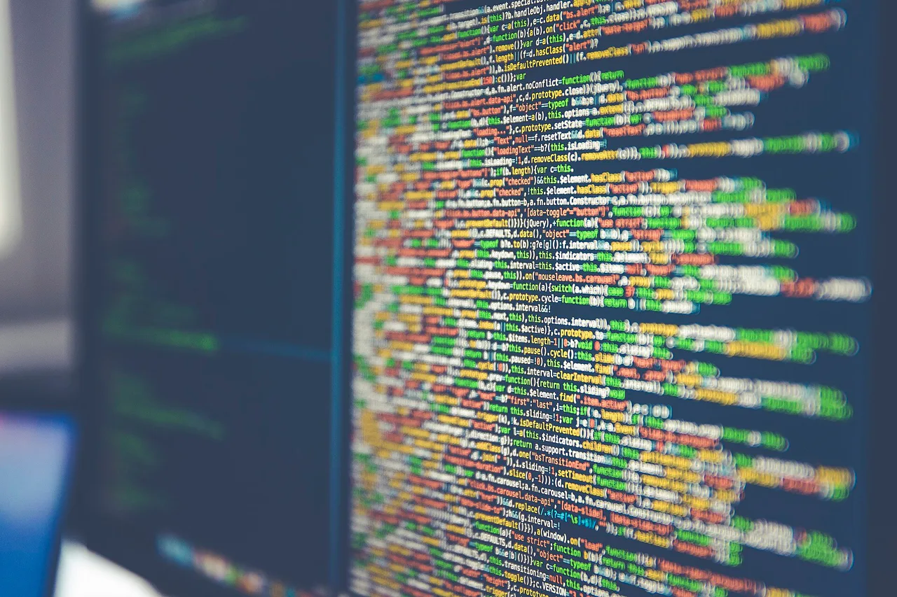 Software code photographed on a computer monitor.