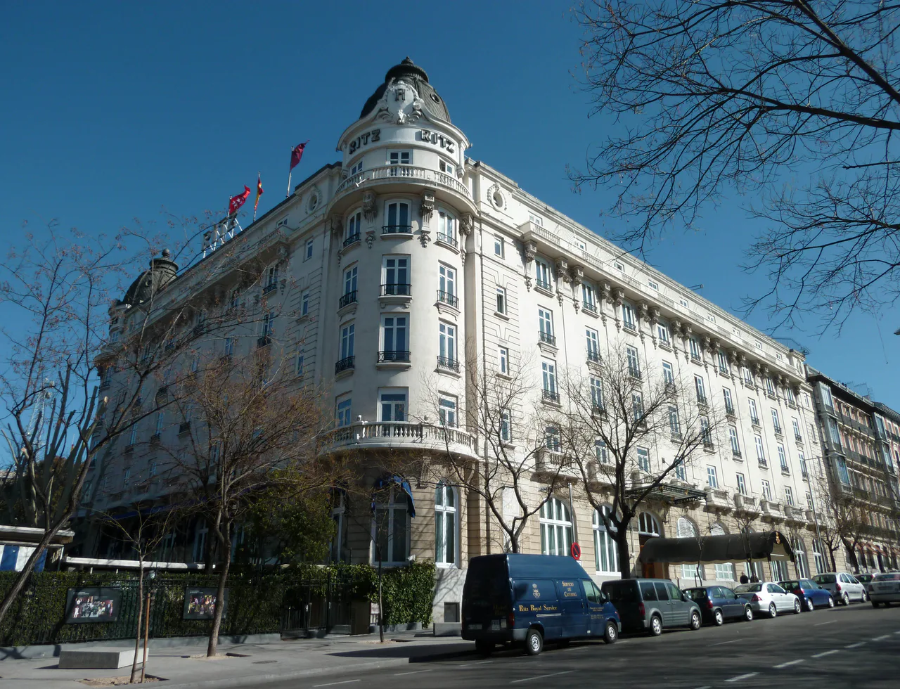The façade of the Ritz Hotel in Madrid with its sign and balconies